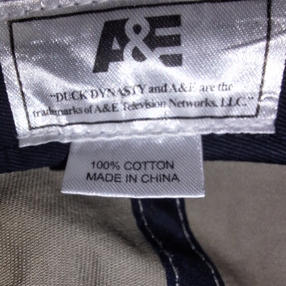 An A&E Duck Dynasty trucker hat with adjustable strap. EUC. Like new condition - Picture 2 of 3